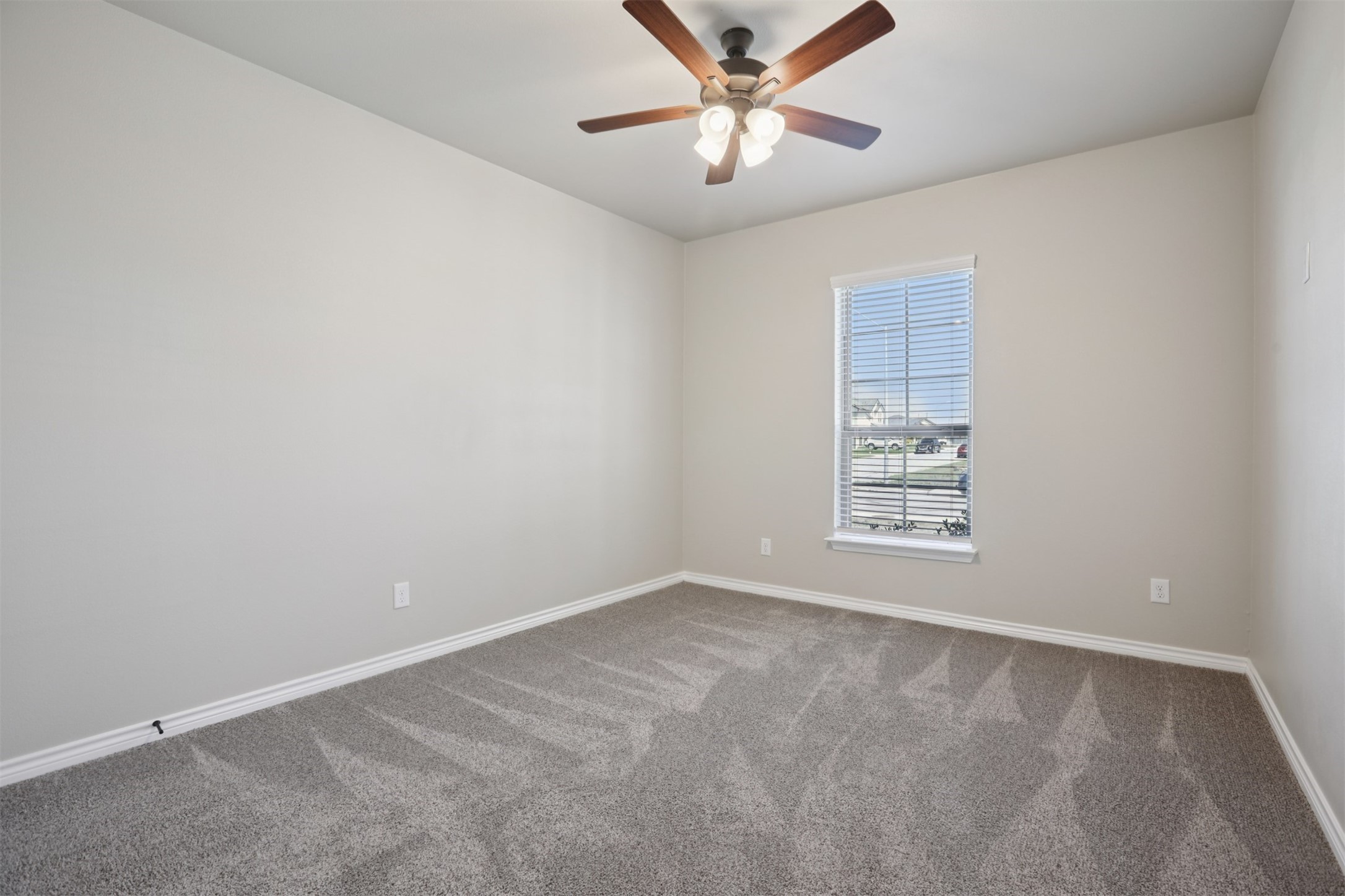 500 Seabiscuit Drive Jarrell, TX 76537 - Photo 21 of 33 an empty room with a window and a fan