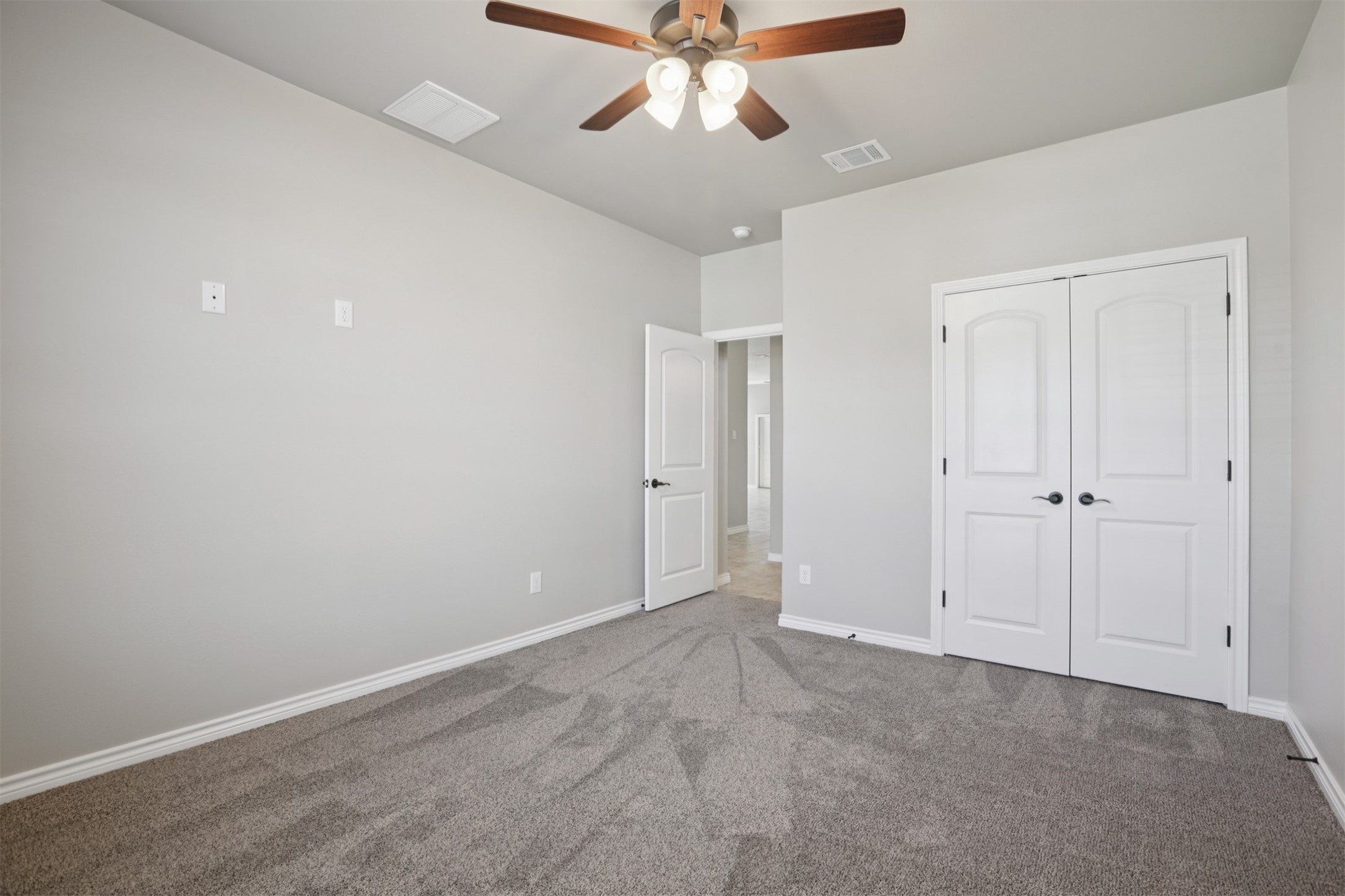 500 Seabiscuit Drive Jarrell, TX 76537 - Photo 22 of 33 a view of an empty room and chandelier fan