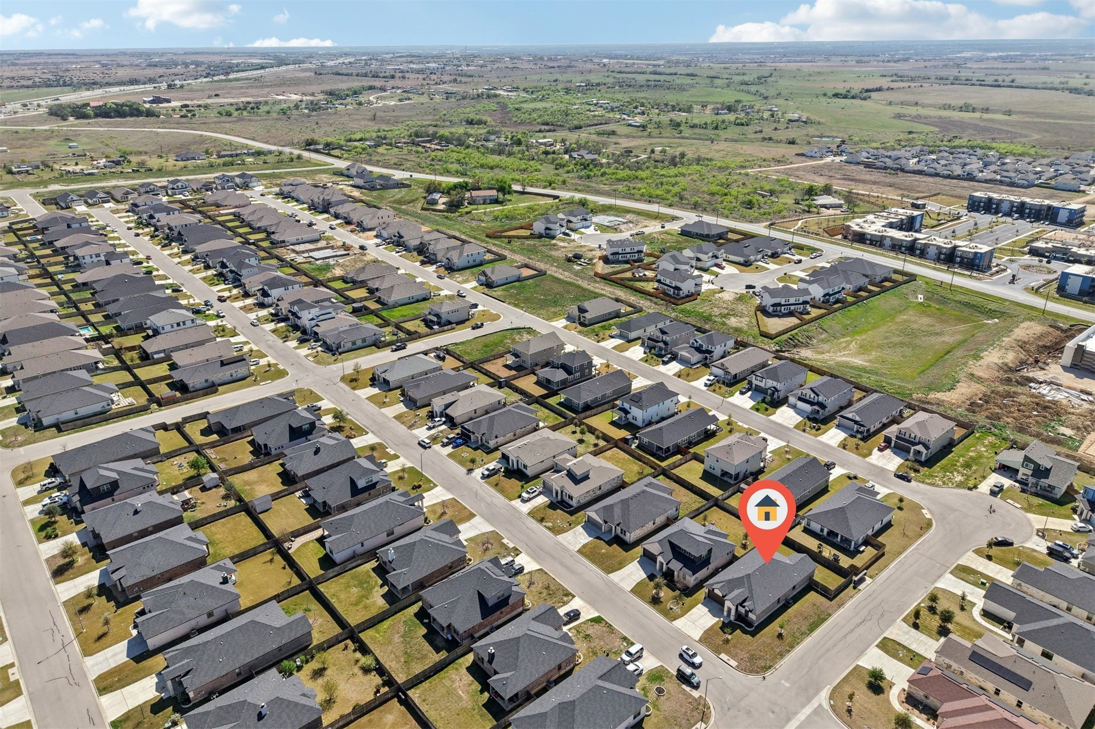 500 Seabiscuit Drive Jarrell, TX 76537 - Photo 32 of 33 an aerial view of a city with lots of residential buildings