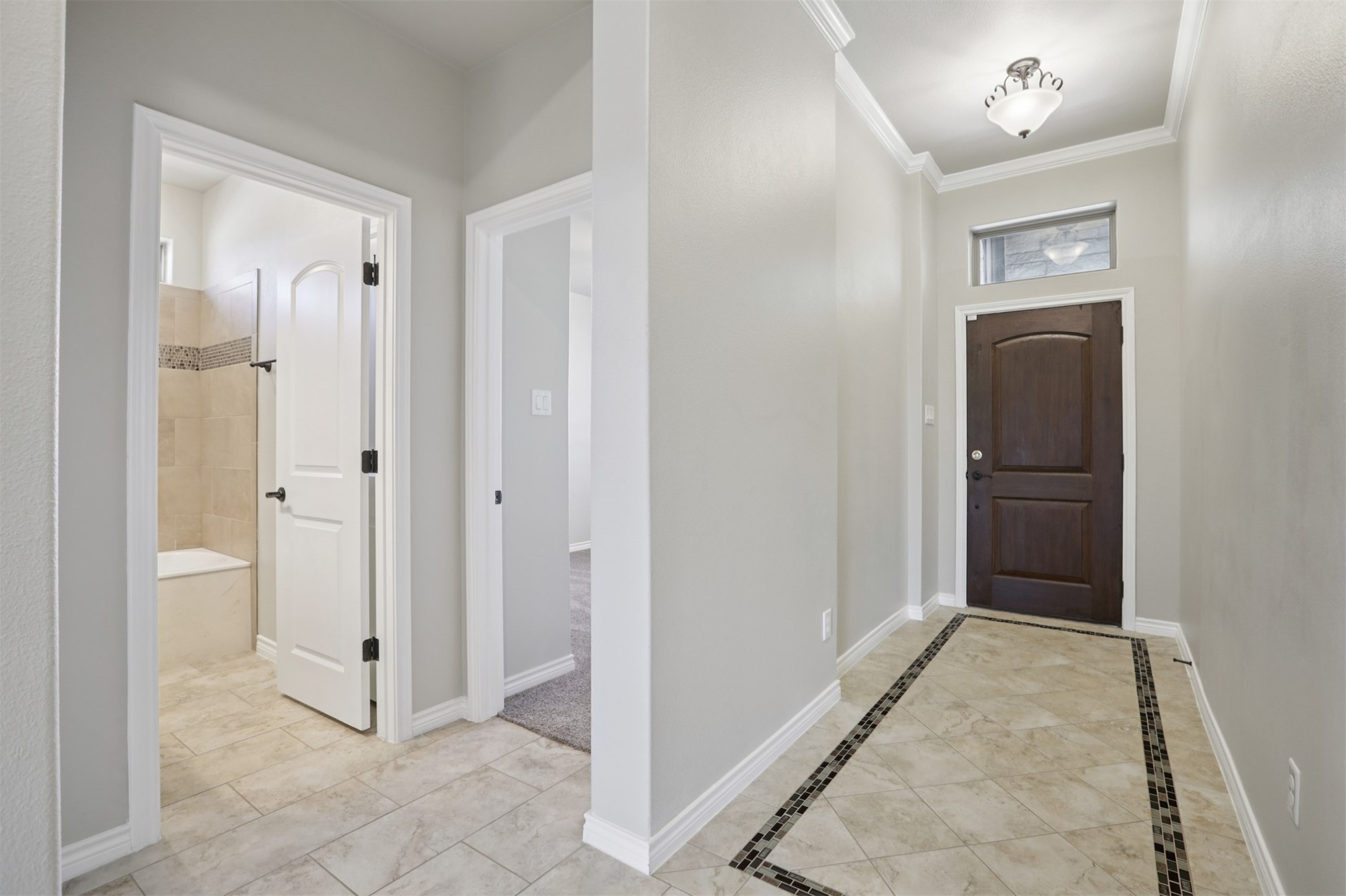 500 Seabiscuit Drive Jarrell, TX 76537 - Photo 4 of 33 a view of a hallway with closet and bathroom