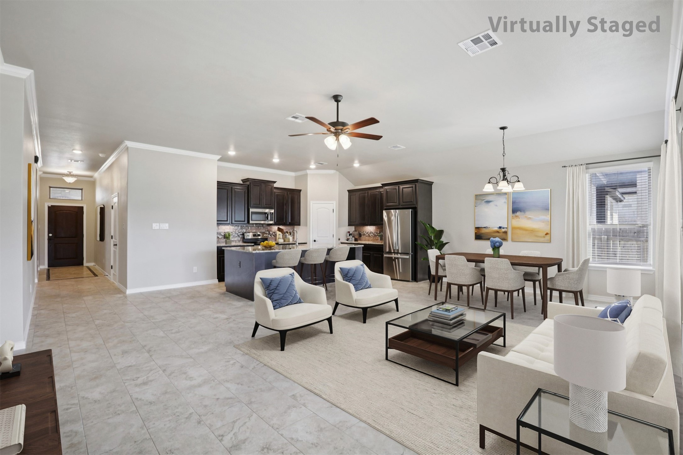 500 Seabiscuit Drive Jarrell, TX 76537 - Photo 5 of 33 a living room with furniture and a chandelier