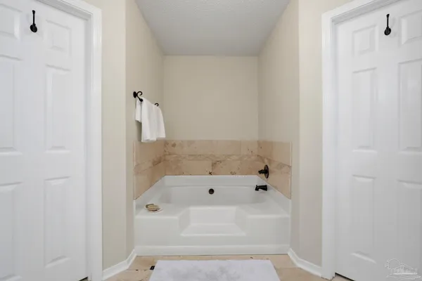 a bathroom with a bathtub