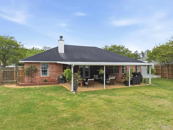 a house view with a garden space
