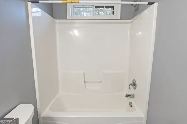 a bathroom with a bathtub