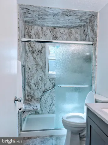 a bathroom with a sink and a toilet