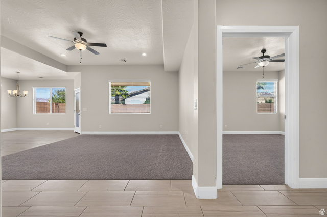 11 East 640 South Ivins, UT 84738 - Photo 30 of 44 Neutral tone walls with recessed lighting and ceiling fans