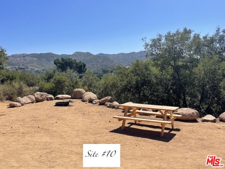 41322 De Luz Road, Unit 15 Fallbrook, CA 92028 - Photo 12 of 24 a view of a backyard with a sitting area