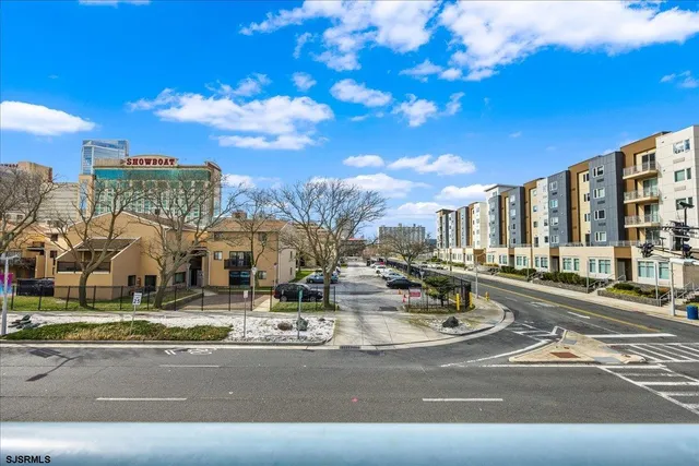 a view of the street with a building