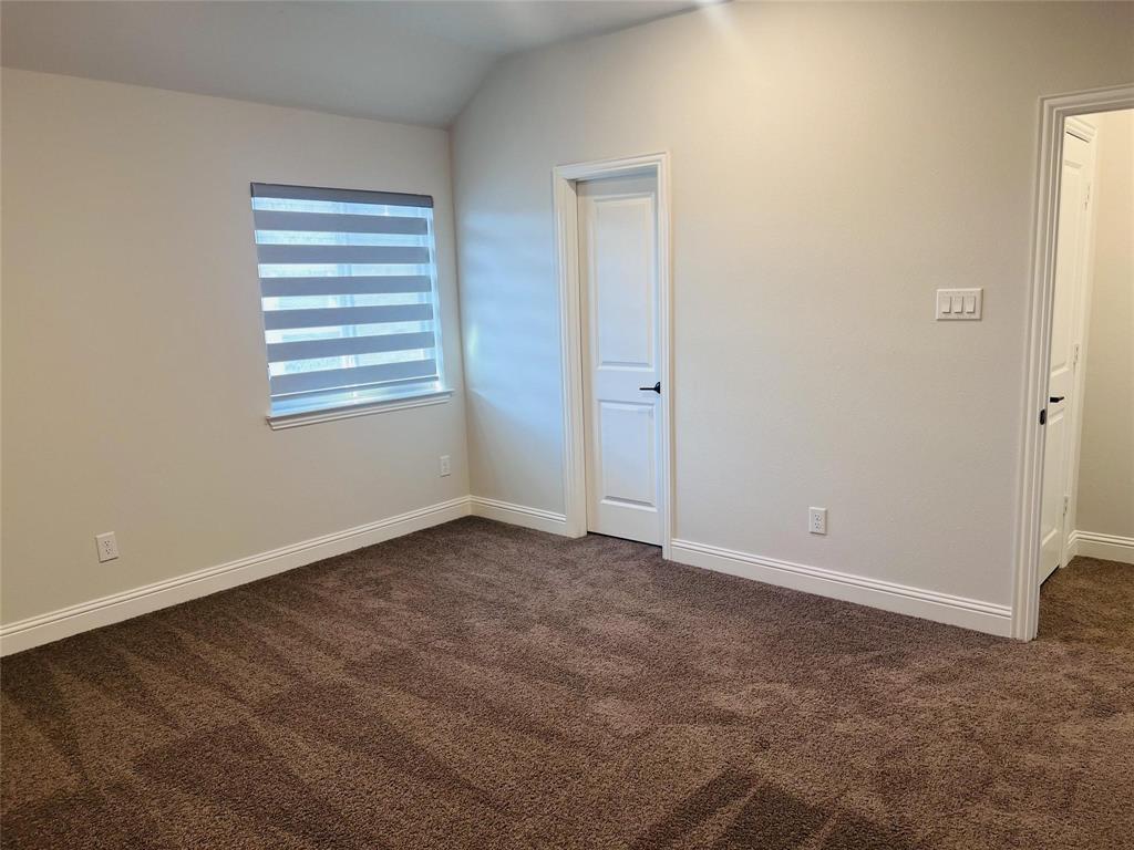 6825 Entwistle Road Frisco, TX 75034 - Photo 22 of 33 a view of an empty room with a window