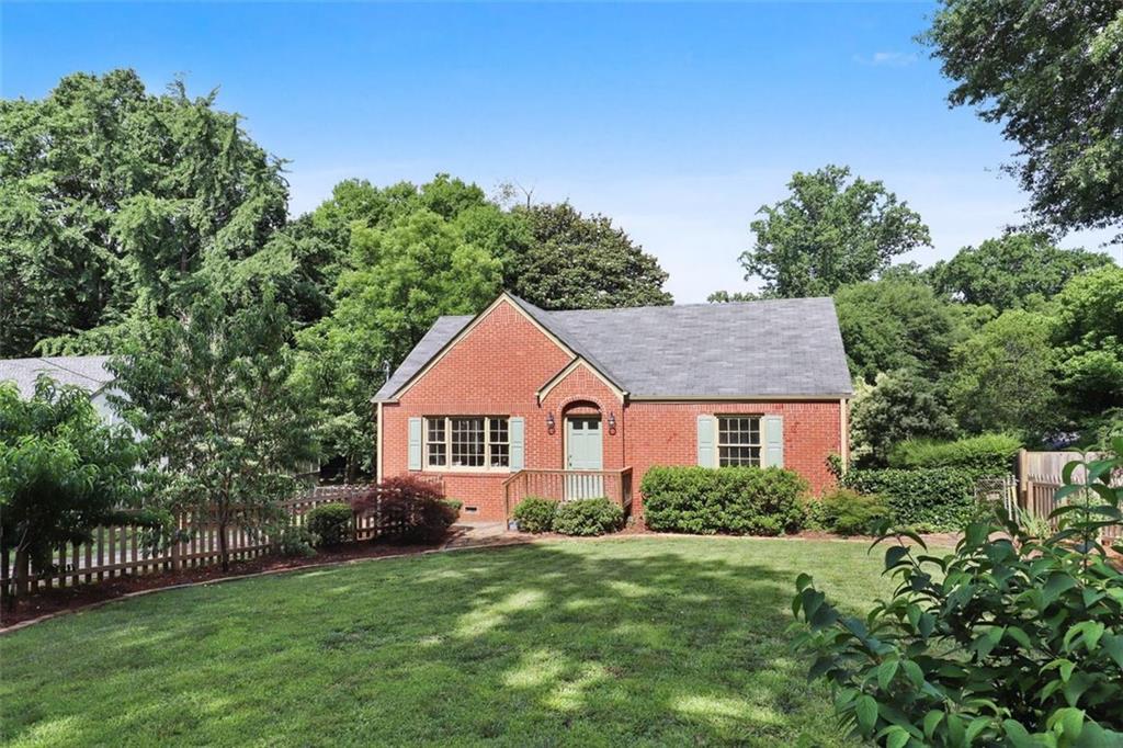 1049 Walker Drive Decatur, GA 30030 - Photo 1 of 1 a front view of a house with a yard