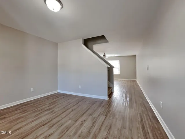 a view of entryway with wooden floor