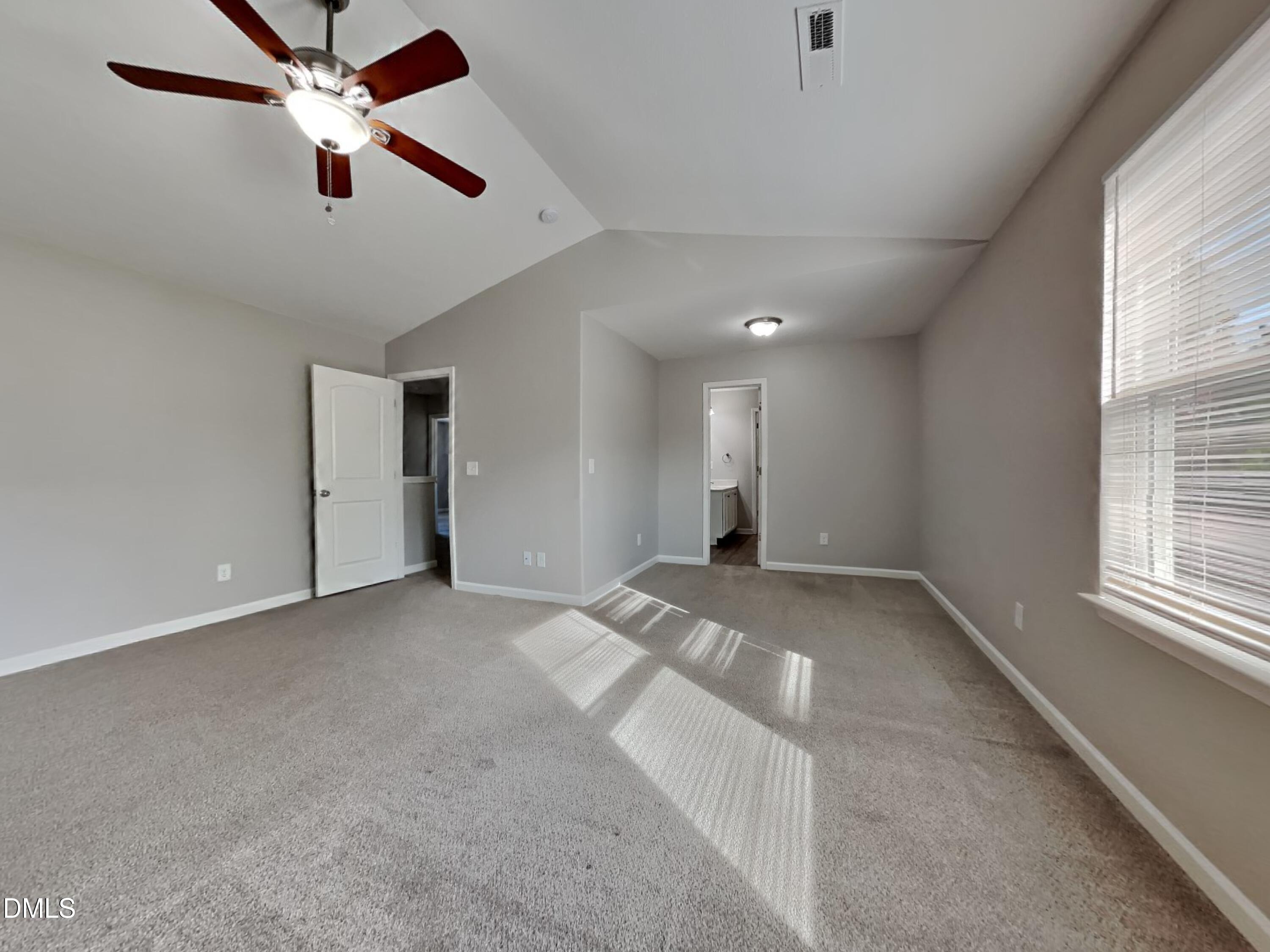 1925 Buffalo Way Durham, NC 27704 - Photo 6 of 16 a view of empty room with window and ceiling fan