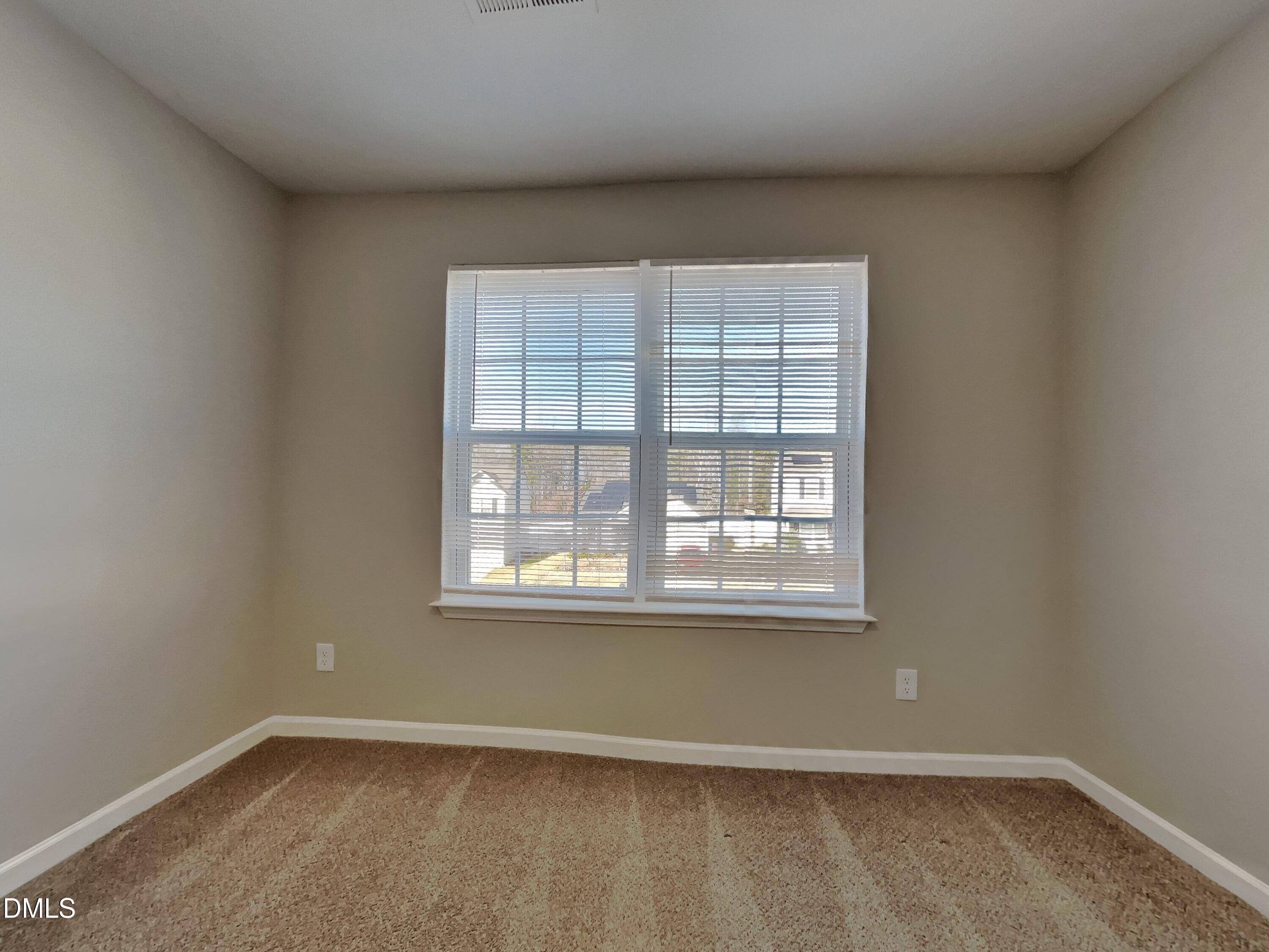 1925 Buffalo Way Durham, NC 27704 - Photo 10 of 16 an empty room with a window