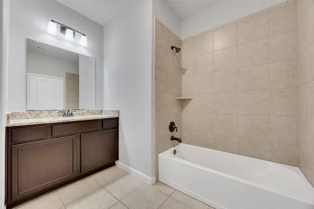 a view of storage and utility room with closet