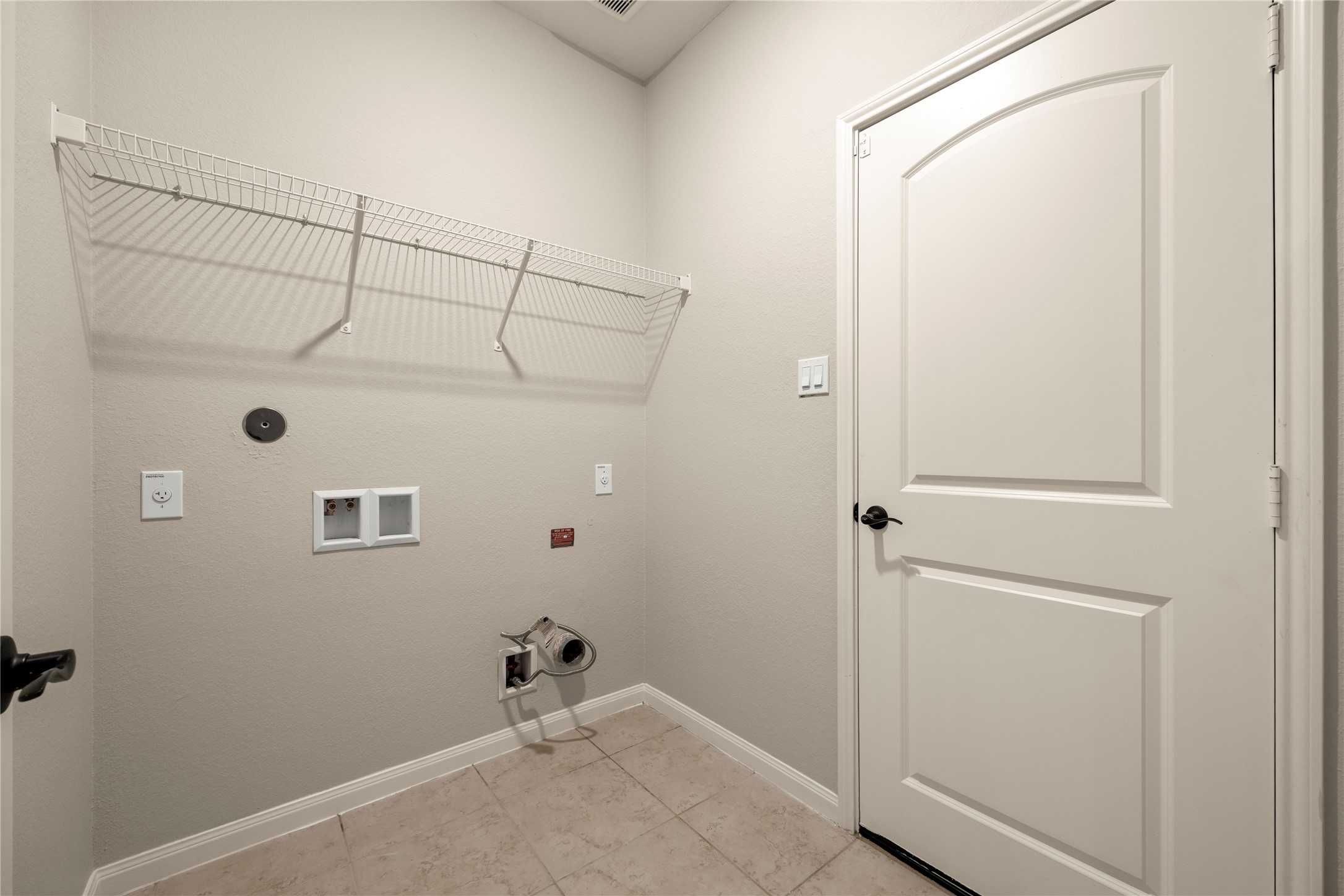 8957 Oval Glass Street Conroe, TX 77304 - Photo 23 of 30 a view of storage and utility room with closet