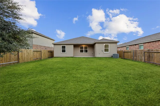 a view of a backyard with a garden