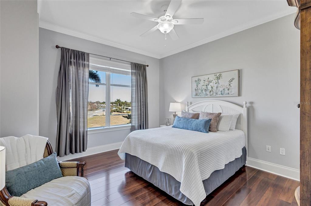 140 Riviera Dunes Way, Unit 206 Palmetto, FL 34221 - Photo 17 of 46 a bedroom with a bed and a window