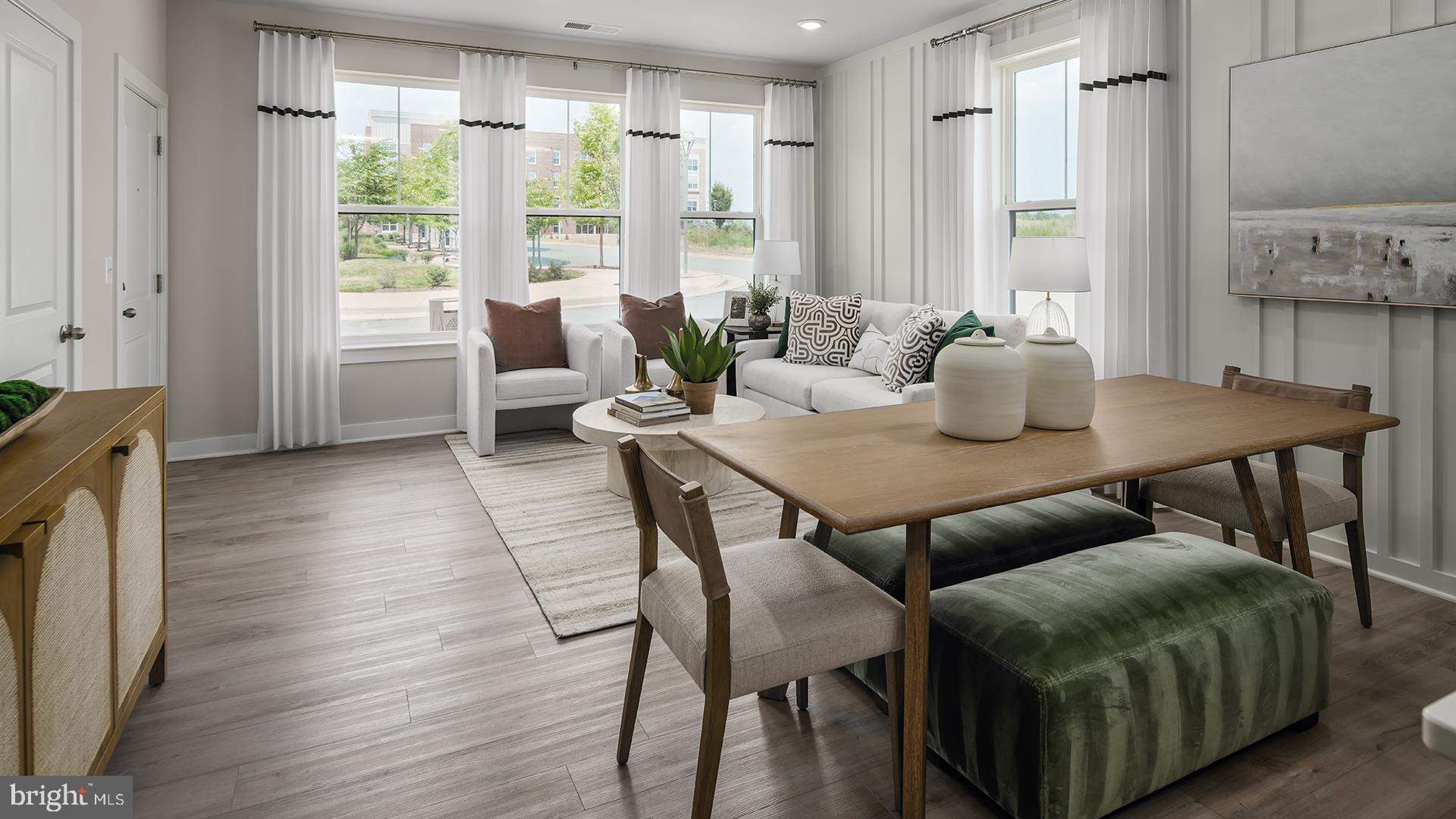 Tbb Cloongee Terrace, Unit ROSSLYN Sterling, VA 20166 - Photo 3 of 14 a living room with furniture and wooden floor