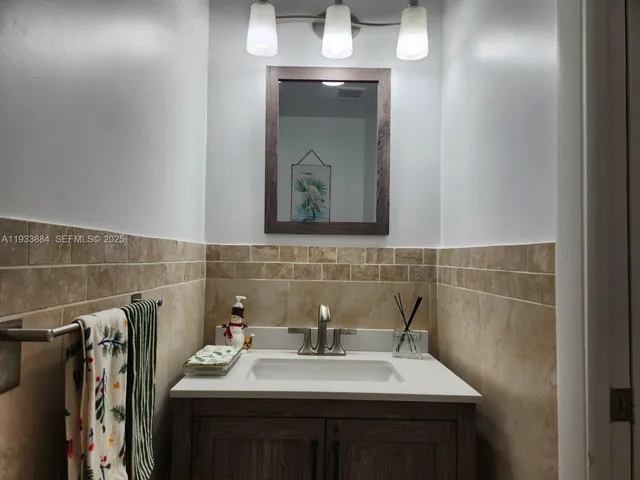 a living room with fireplace furniture and a flat screen tv