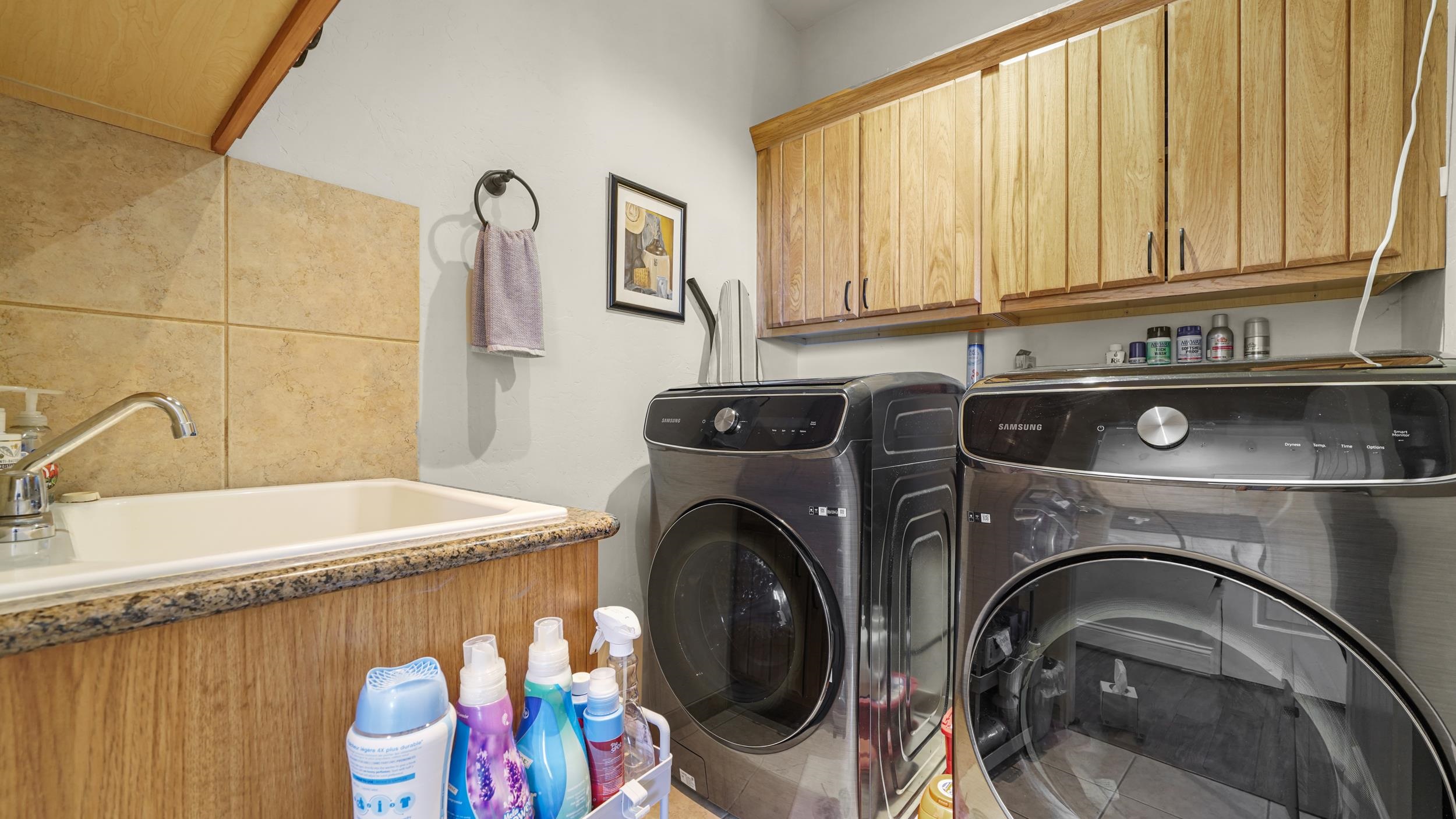 809 Mease Road Grand Junction, CO 81505 - Photo 23 of 38 a utility room with sink dryer and washer