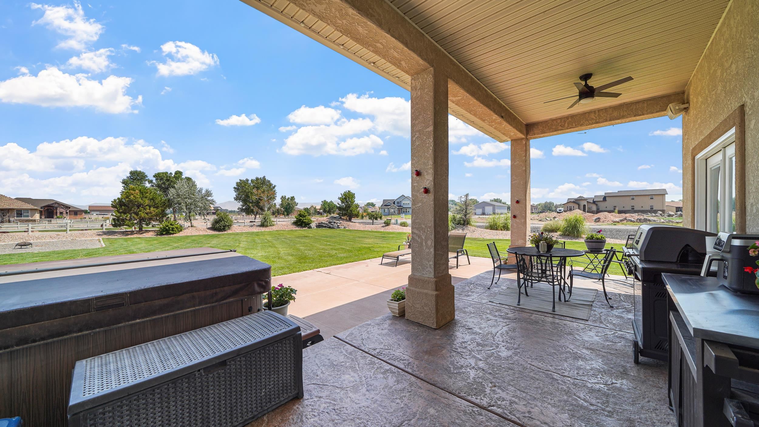 809 Mease Road Grand Junction, CO 81505 - Photo 26 of 38 a building outdoor space with patio furniture and city view