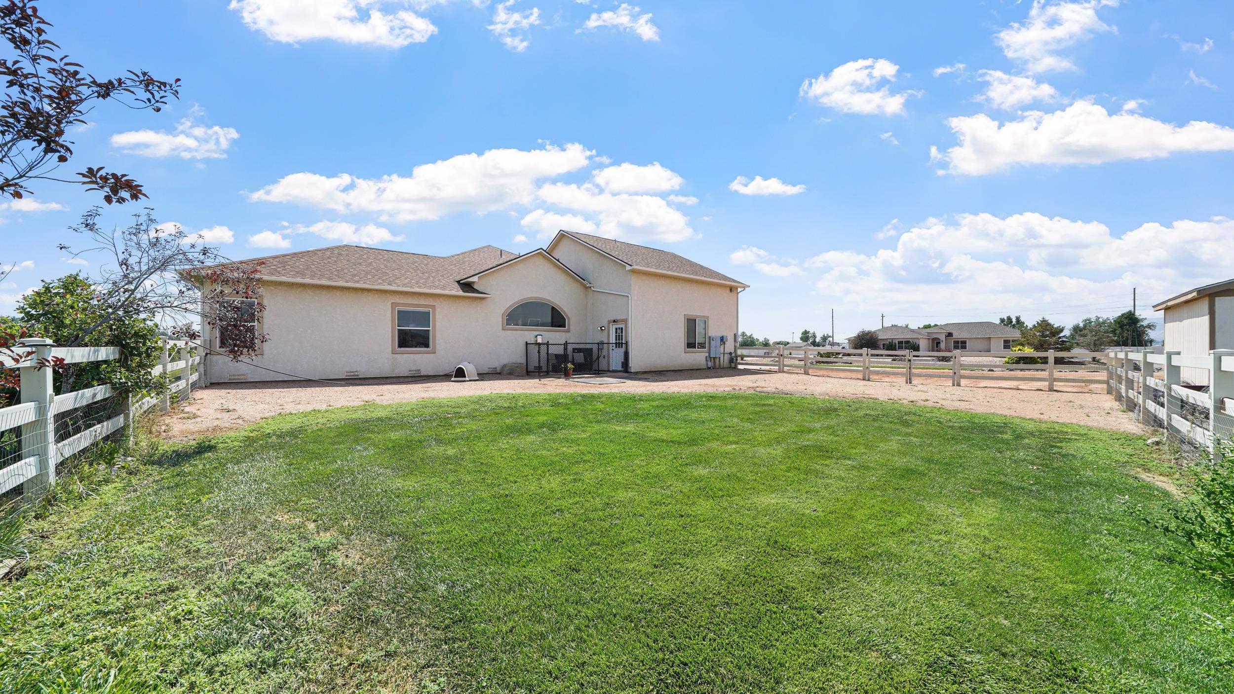 809 Mease Road Grand Junction, CO 81505 - Photo 28 of 38 a view of house with garden and entertaining space