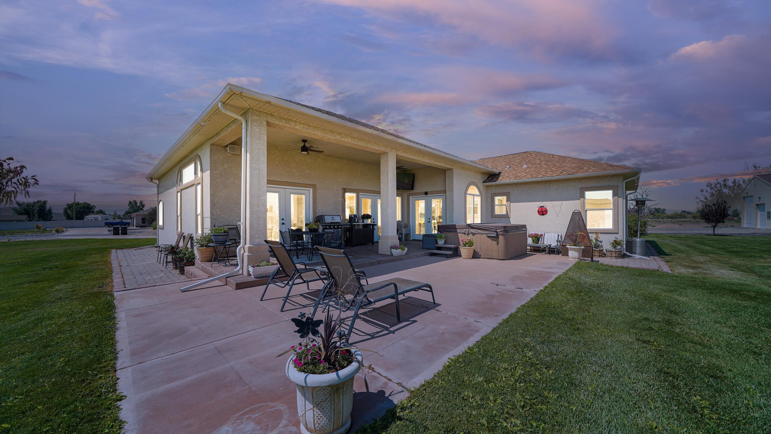809 Mease Road Grand Junction, CO 81505 - Photo 29 of 38 a view of a house with backyard porch and sitting area
