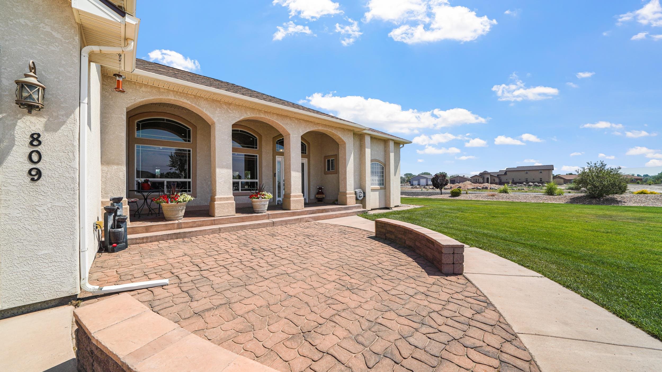 809 Mease Road Grand Junction, CO 81505 - Photo 3 of 38 a view of a house with a porch