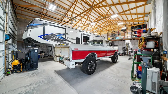 a car is parked in front of garage