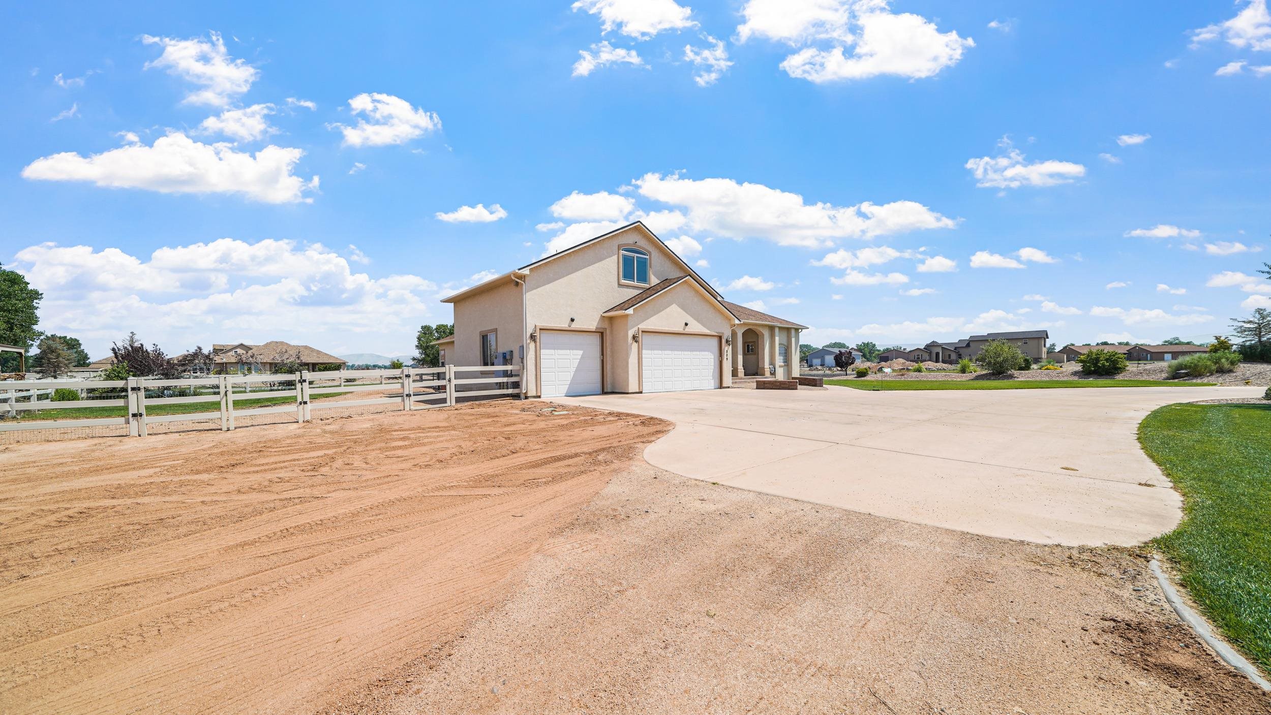 809 Mease Road Grand Junction, CO 81505 - Photo 34 of 38 a view of swimming pool with outdoor seating and city view