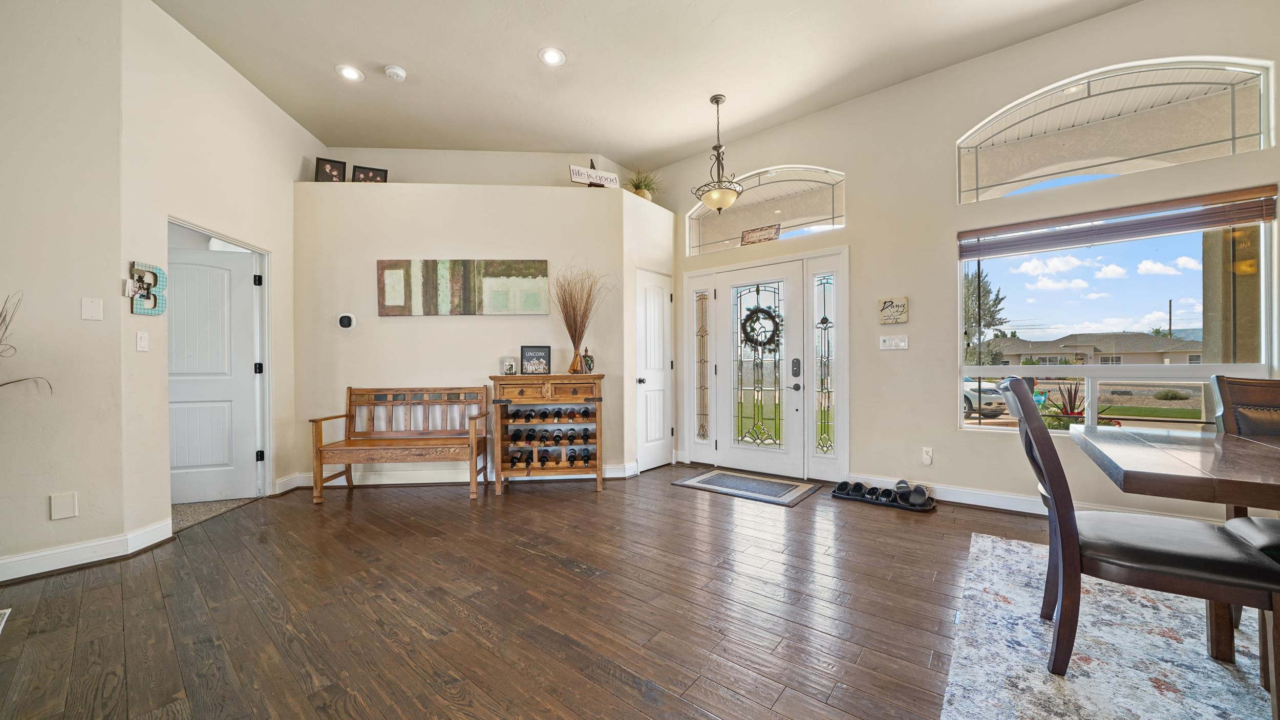 809 Mease Road Grand Junction, CO 81505 - Photo 6 of 38 an empty room with wooden floor and outdoor seating