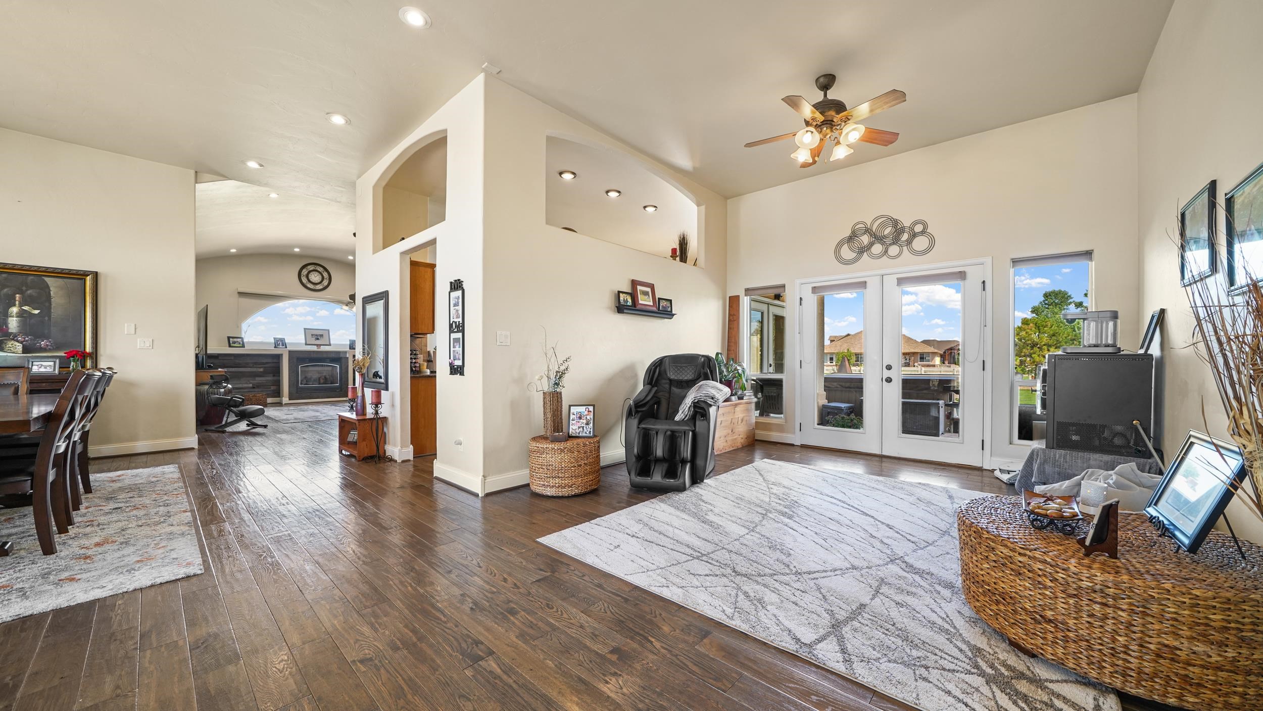 809 Mease Road Grand Junction, CO 81505 - Photo 7 of 38 a living room with furniture and a chandelier