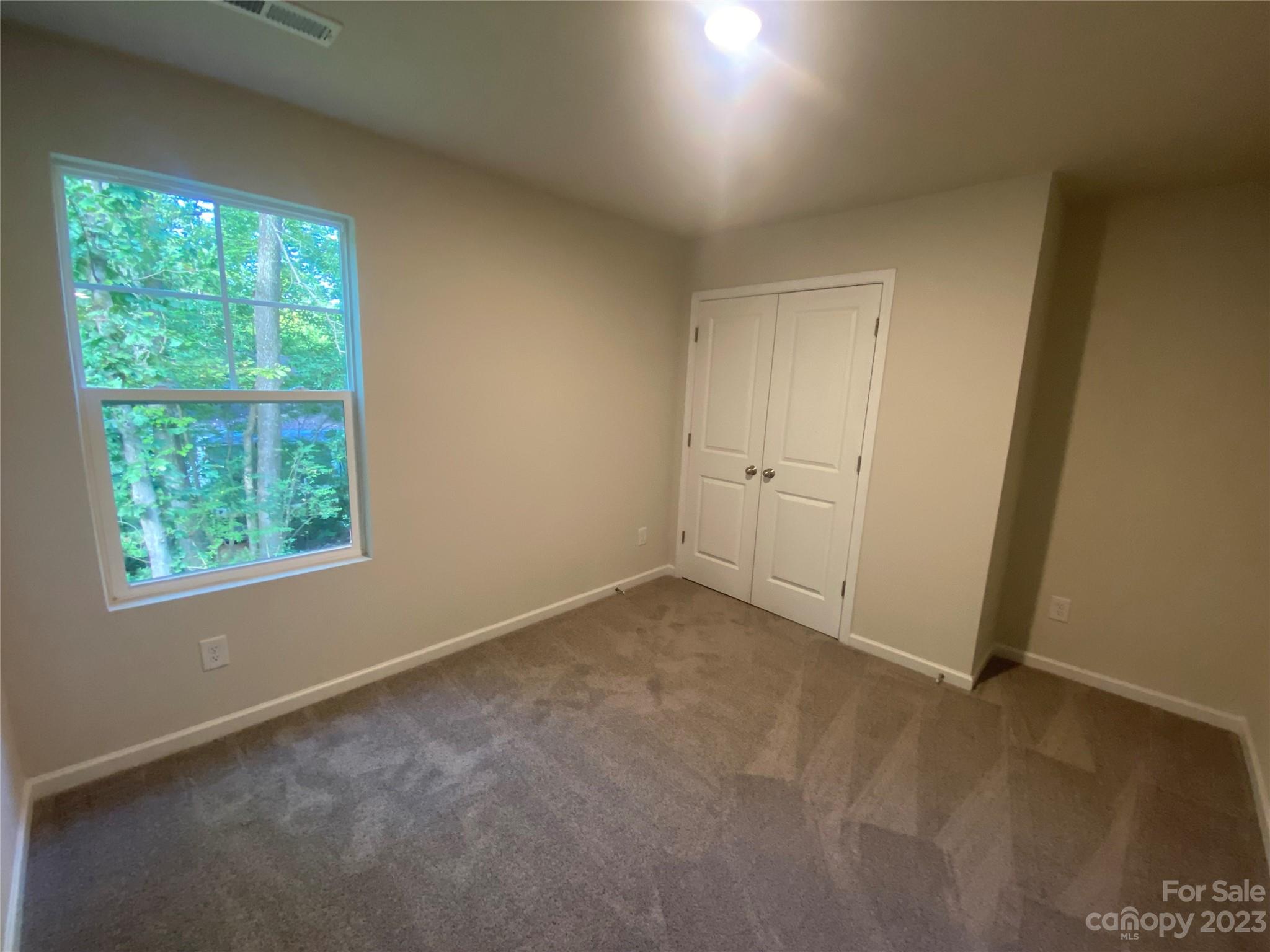 2903 Allen Road South Charlotte, NC 28269 - Photo 11 of 12 an empty room with windows