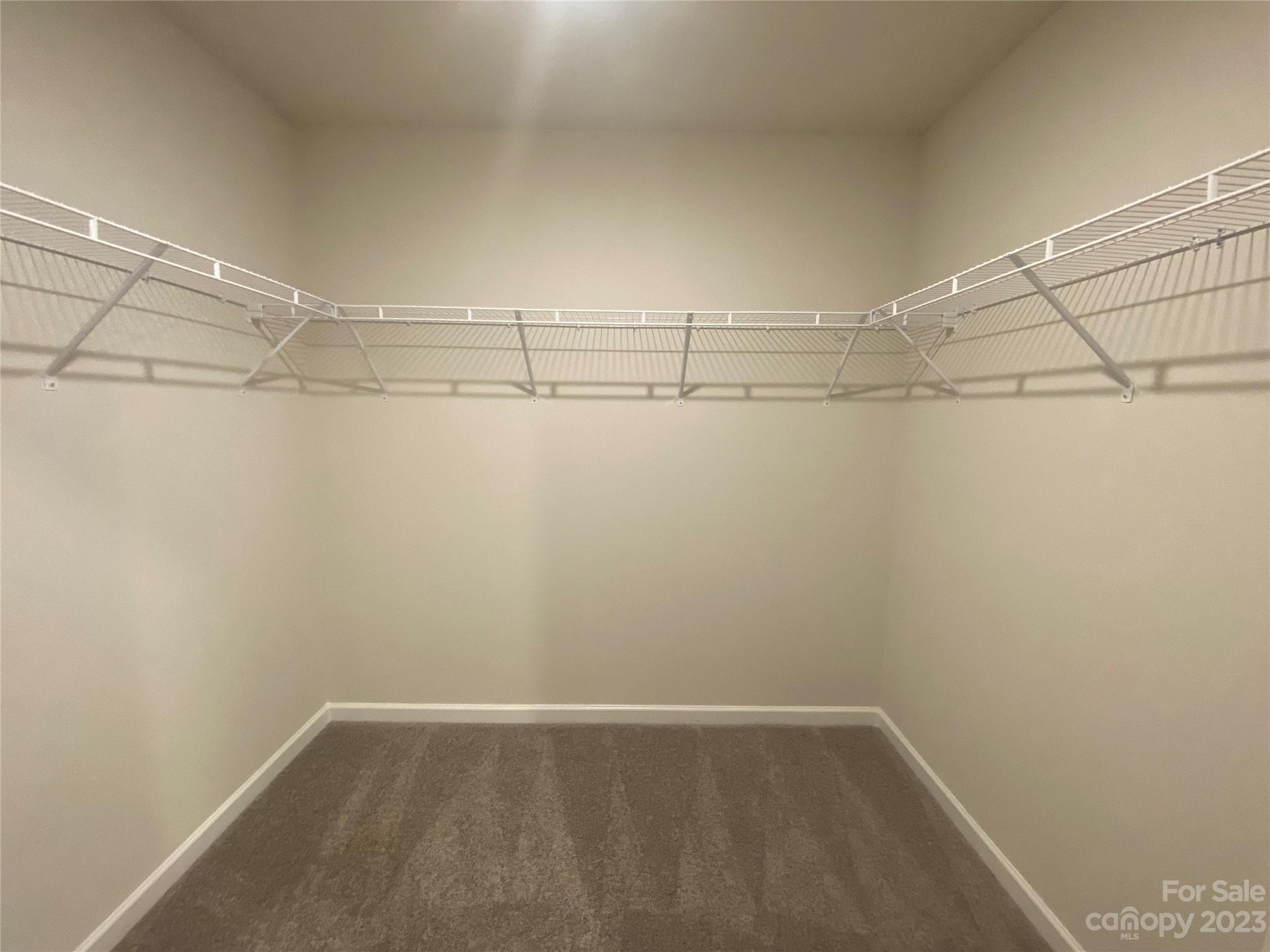 2903 Allen Road South Charlotte, NC 28269 - Photo 9 of 12 a view of a room with racks on the wall