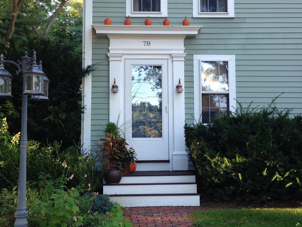 78 River Road Merrimac, MA 01860 - Photo 3 of 21 a front view of a house with plants