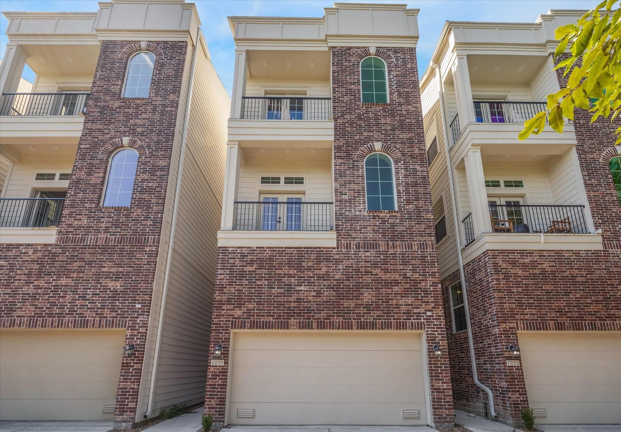 1035 West 17th Street Houston, TX 77008 - Photo 2 of 26 a front view of a building with a brick wall