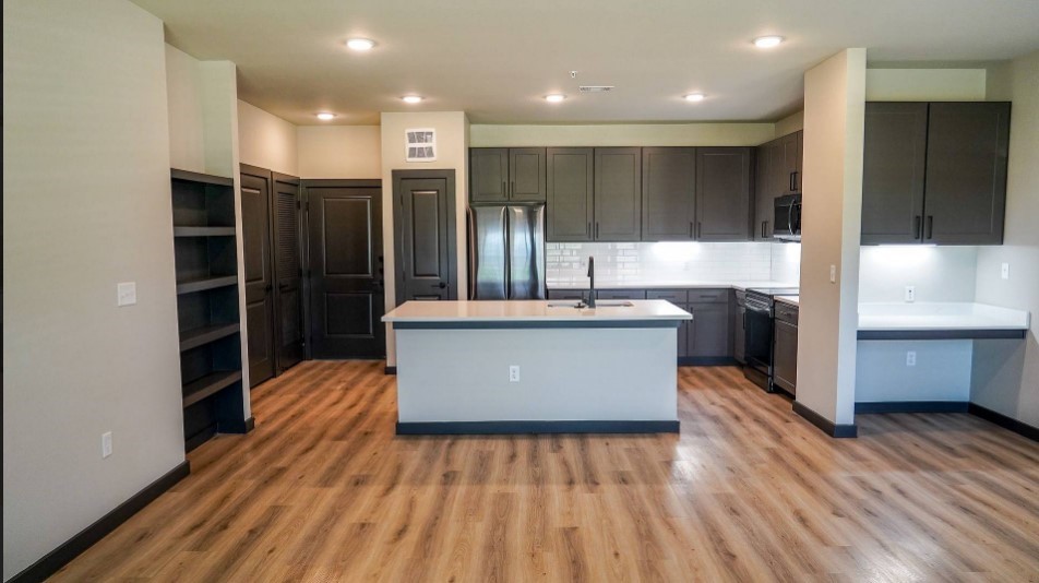 2953 Fm 2920 Rd Spring, Unit 13301 Spring, TX 77388 - Photo 8 of 36 a large kitchen with stainless steel appliances a large counter top