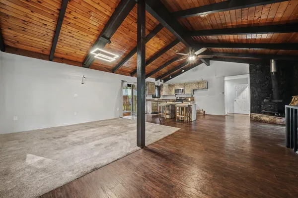 a view of a chairs and table in a room