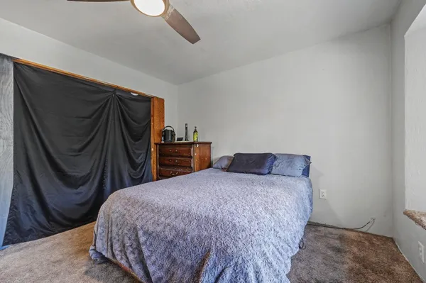 a view of a wooden deck with a yard