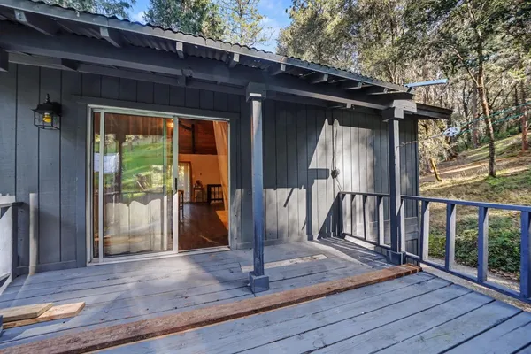 a aerial view of a house with a yard