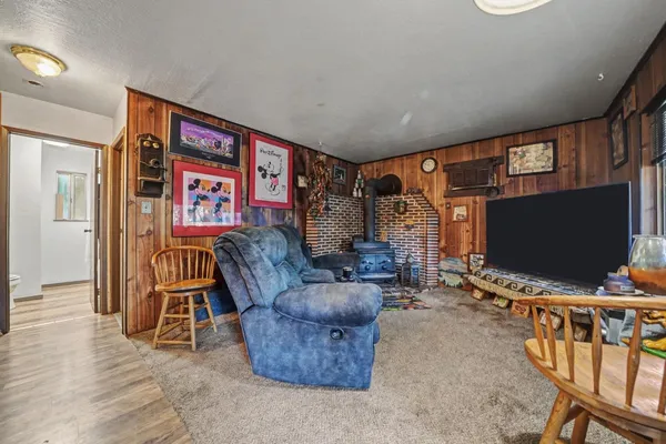 a kitchen with a stove a refrigerator and a sink