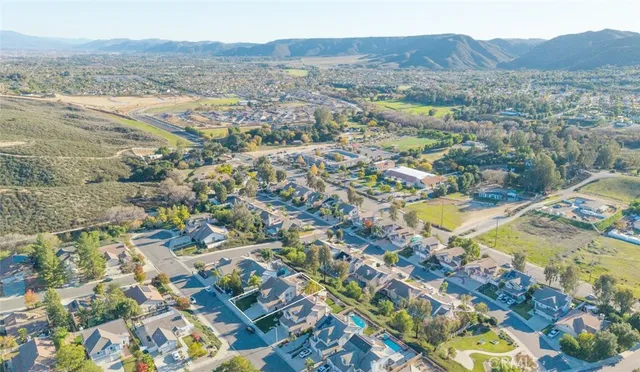a view of a city with mountains in the background