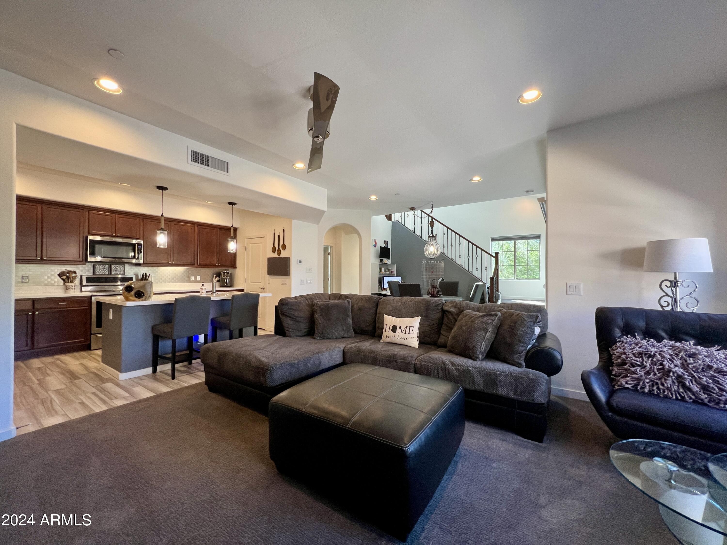 3935 East Rough Rider Road, Unit 1296 Phoenix, AZ 85050 - Photo 8 of 29 Open Living