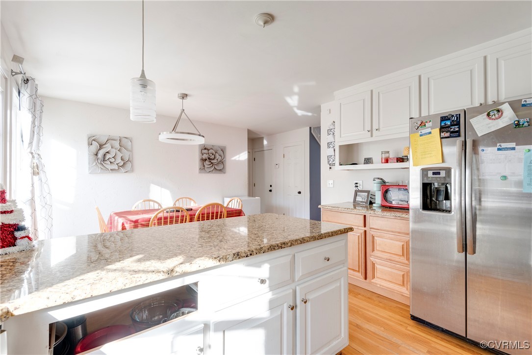 14055 Princess Mary Road Chesterfield, VA 23838 - Photo 15 of 41 Kitchen featuring white cabinetry, a center island