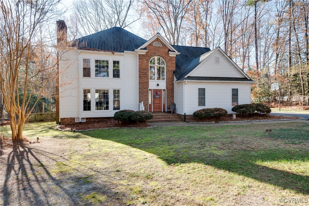 14055 Princess Mary Road Chesterfield, VA 23838 - Photo 2 of 41 View of front of house featuring a front lawn