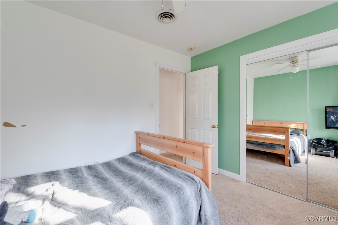 14055 Princess Mary Road Chesterfield, VA 23838 - Photo 31 of 41 Bedroom with carpet floors, a closet, and ceiling