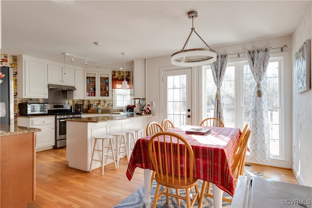 14055 Princess Mary Road Chesterfield, VA 23838 - Photo 8 of 41 Dining area with plenty of natural light, rail lig
