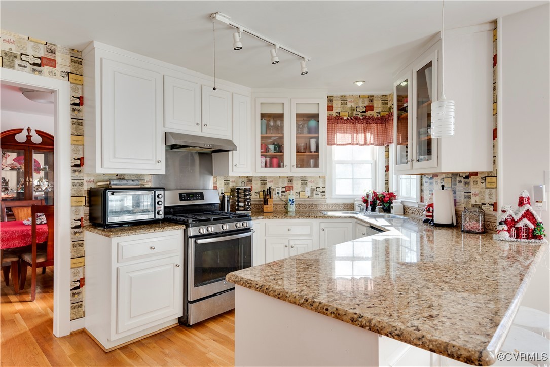 14055 Princess Mary Road Chesterfield, VA 23838 - Photo 10 of 41 Kitchen with white cabinetry, stainless steel rang