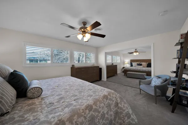 a view of staircase with railing and stairs