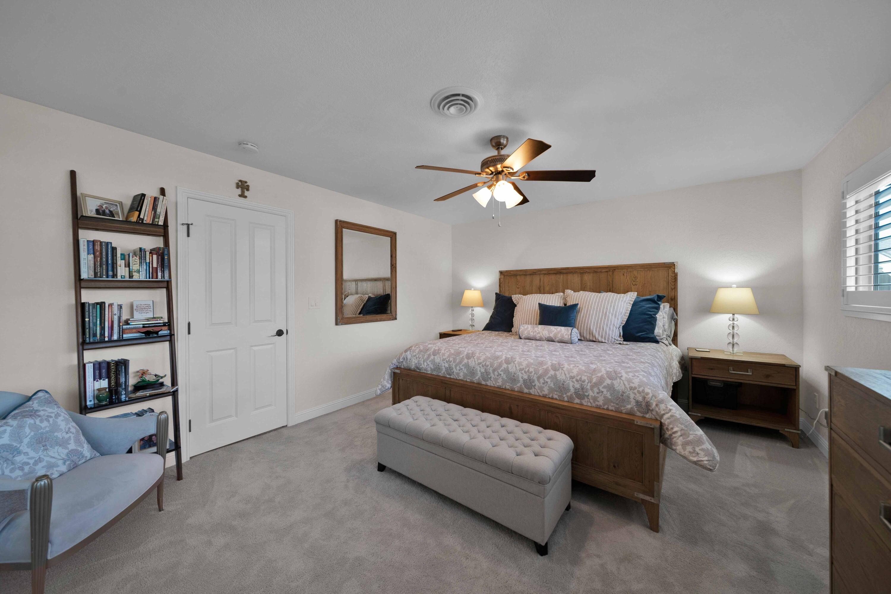 1928 Bechelli Lane Redding, CA 96002 - Photo 28 of 62 a bedroom with a bed furniture and painting on the wall